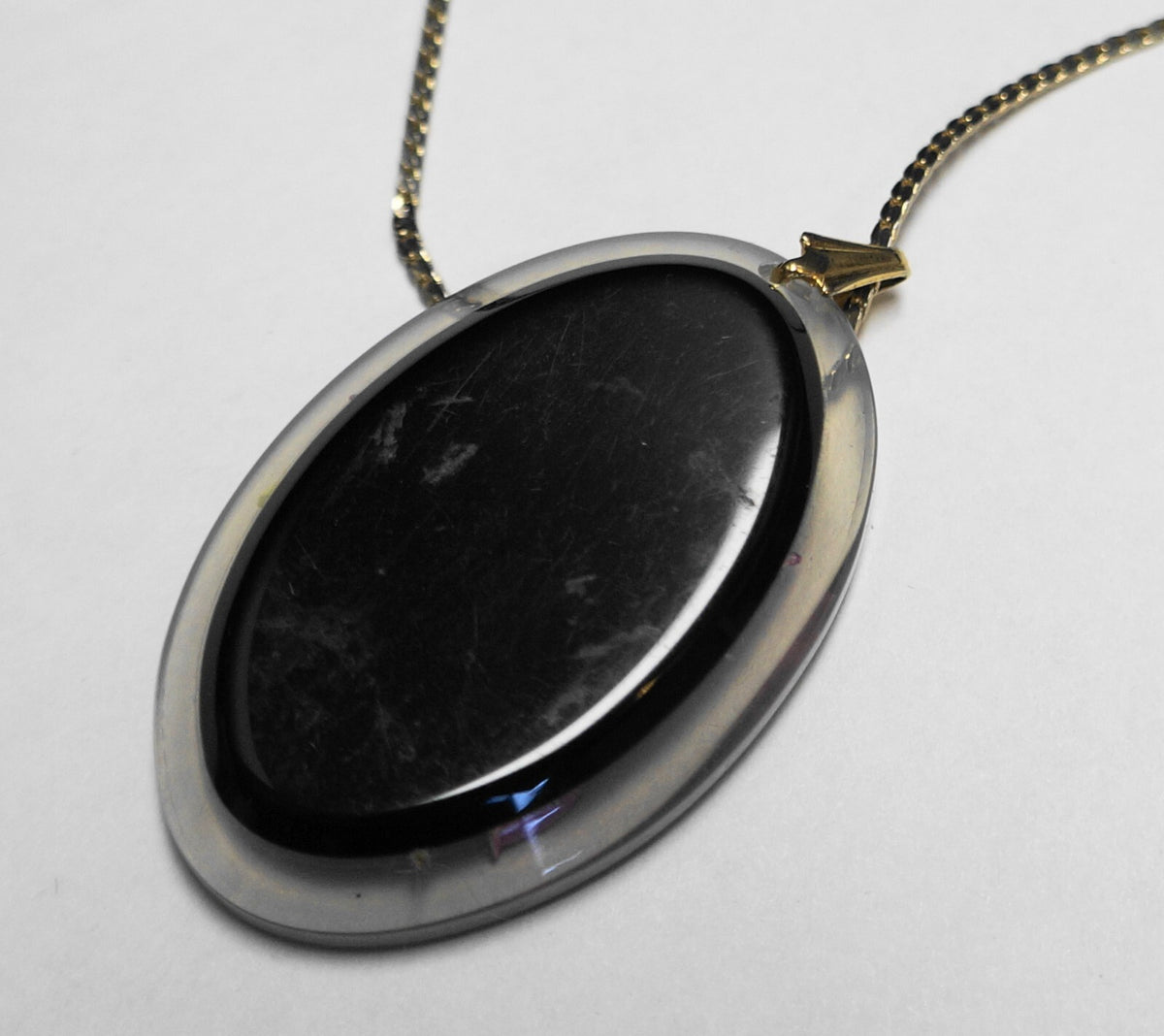 Reverse Carved Orchid Flower Lucite Oval Pendant Necklace