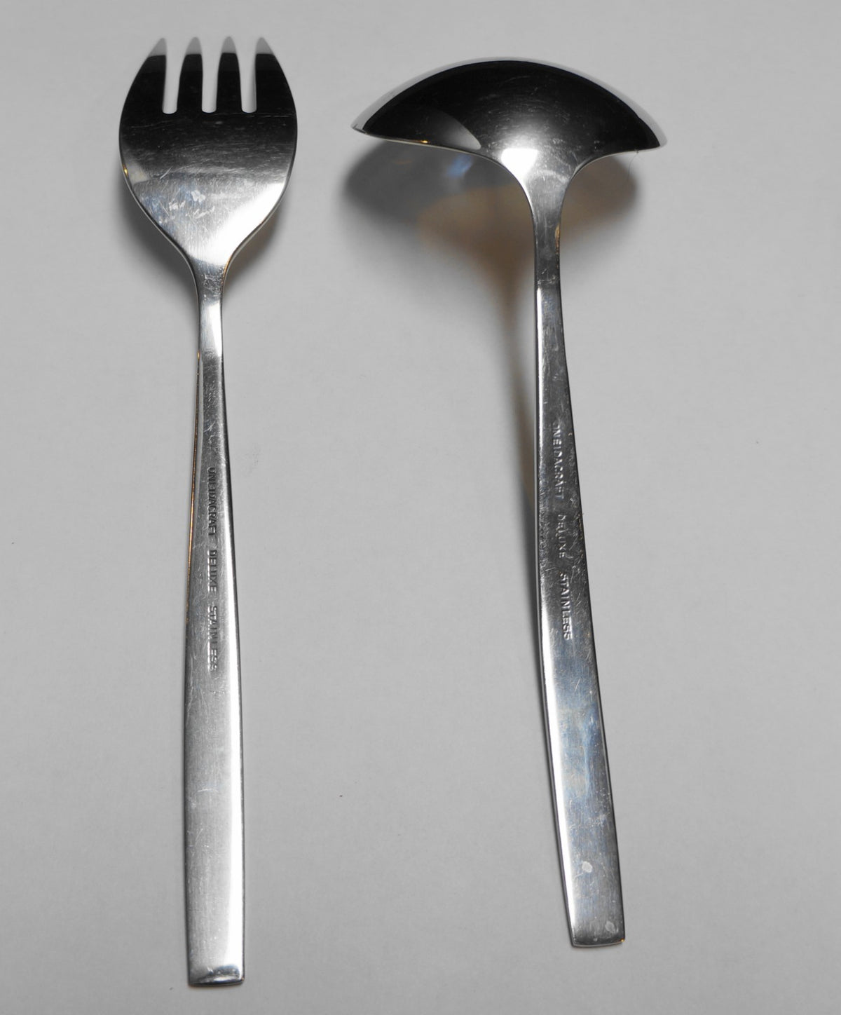 Oneida Capistrano Deluxe Rose Gravy Ladle Serving Fork Pair