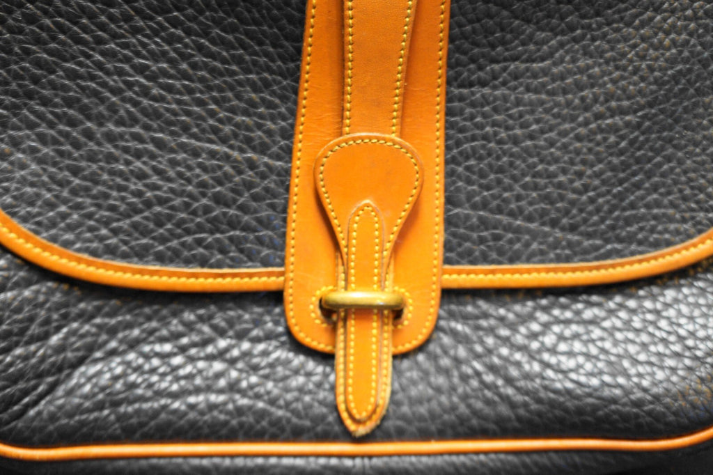 Dooney & Bourke All Weather Leather Black Pebbled British Tan Trim Equestrian