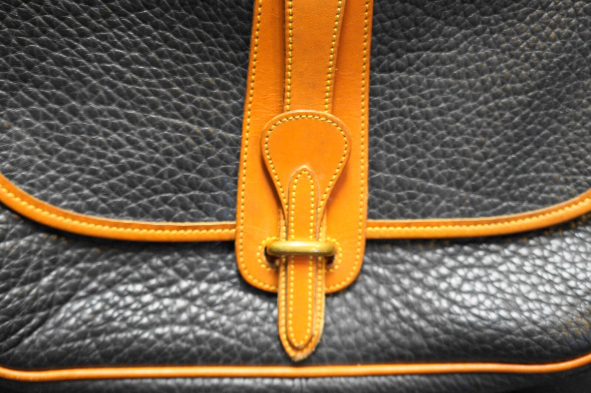 Dooney & Bourke All Weather Leather Black Pebbled British Tan Trim Equestrian