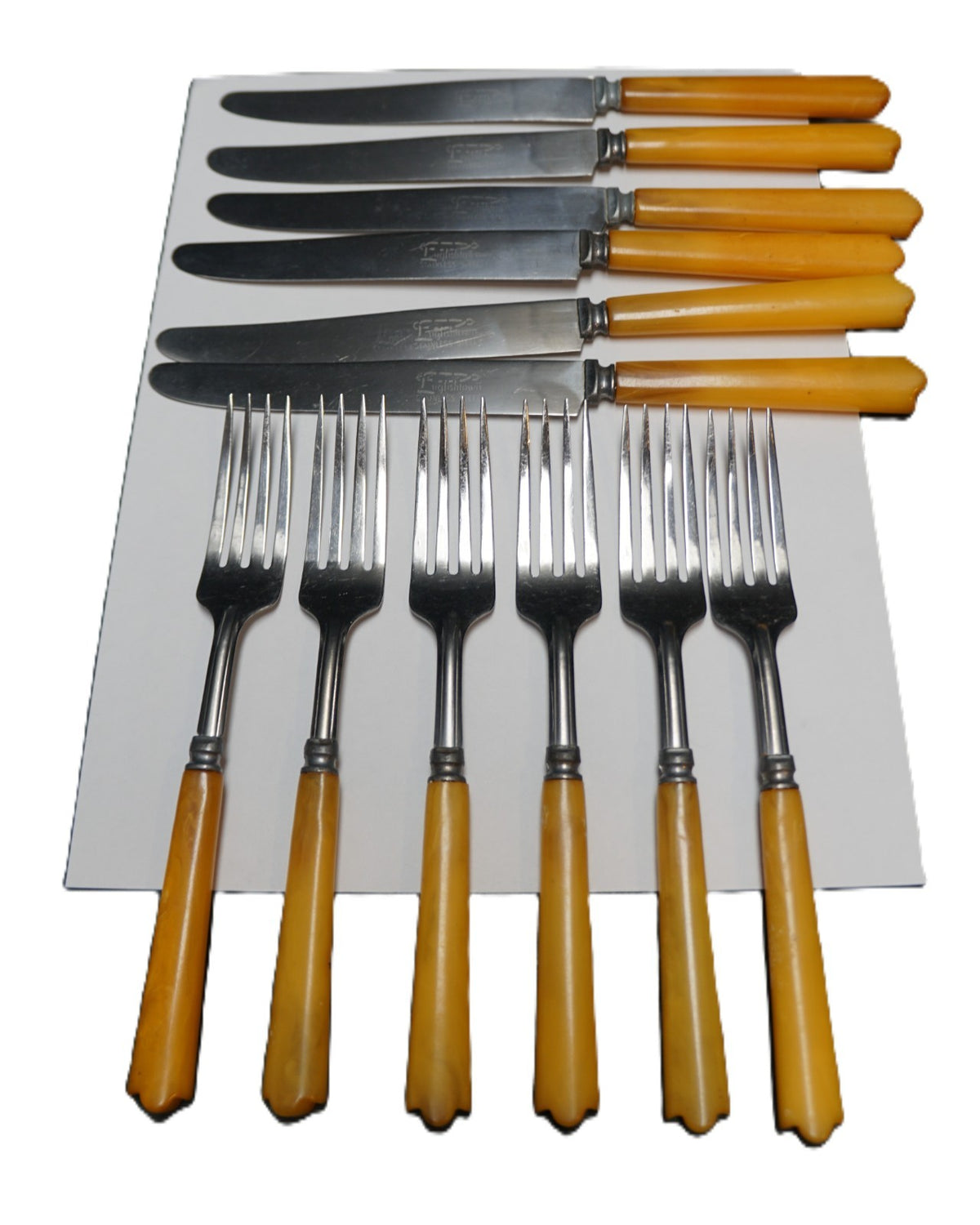 Englishtown Stainless Art Deco Butterscotch Bakelite Handle Flatware 12 Pieces