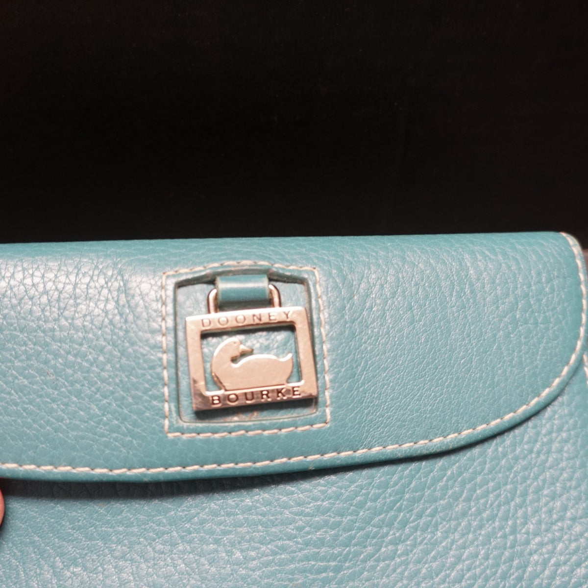 Dooney and Bourke Continental Clutch Pebbled Leather Teal Wallet