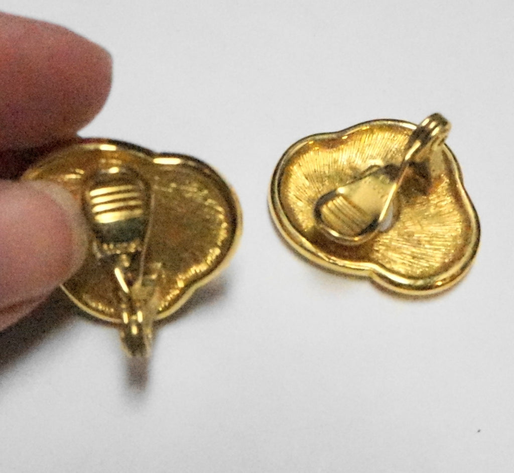 Monet Cream Enamel Gold Tone Eternity Swirl Clip Earrings