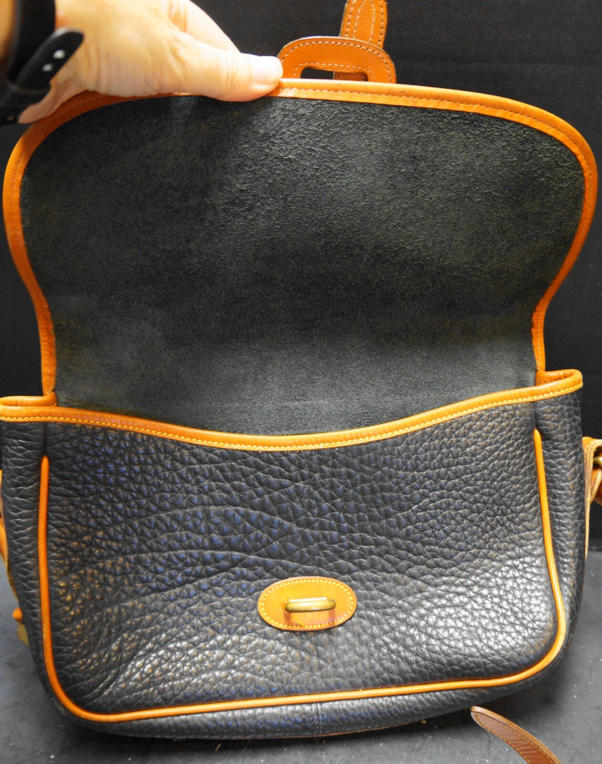 Dooney & Bourke All Weather Leather Black Pebbled British Tan Trim Equestrian