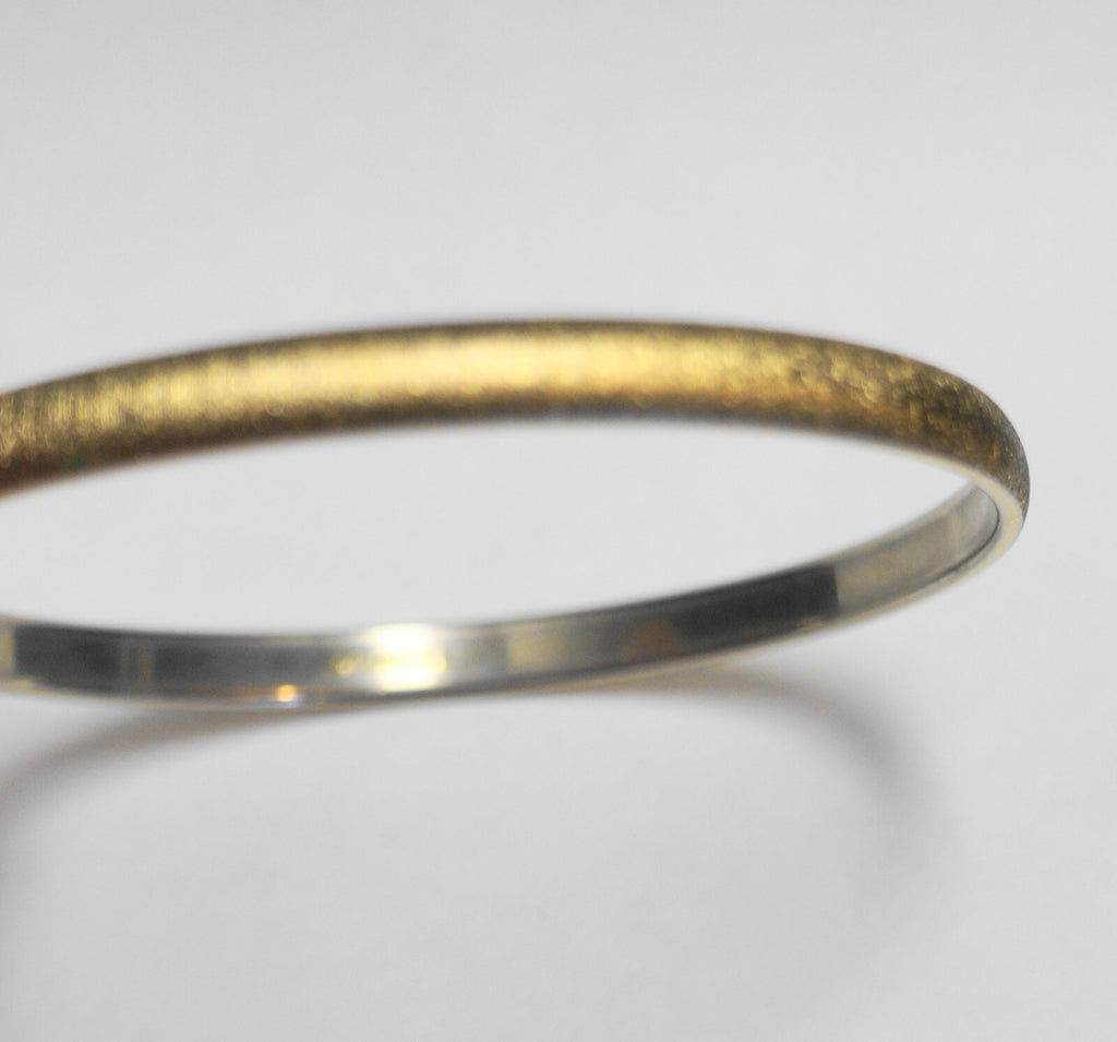 Monet Brushed Gold Tone Narrow Bangle Bracelet