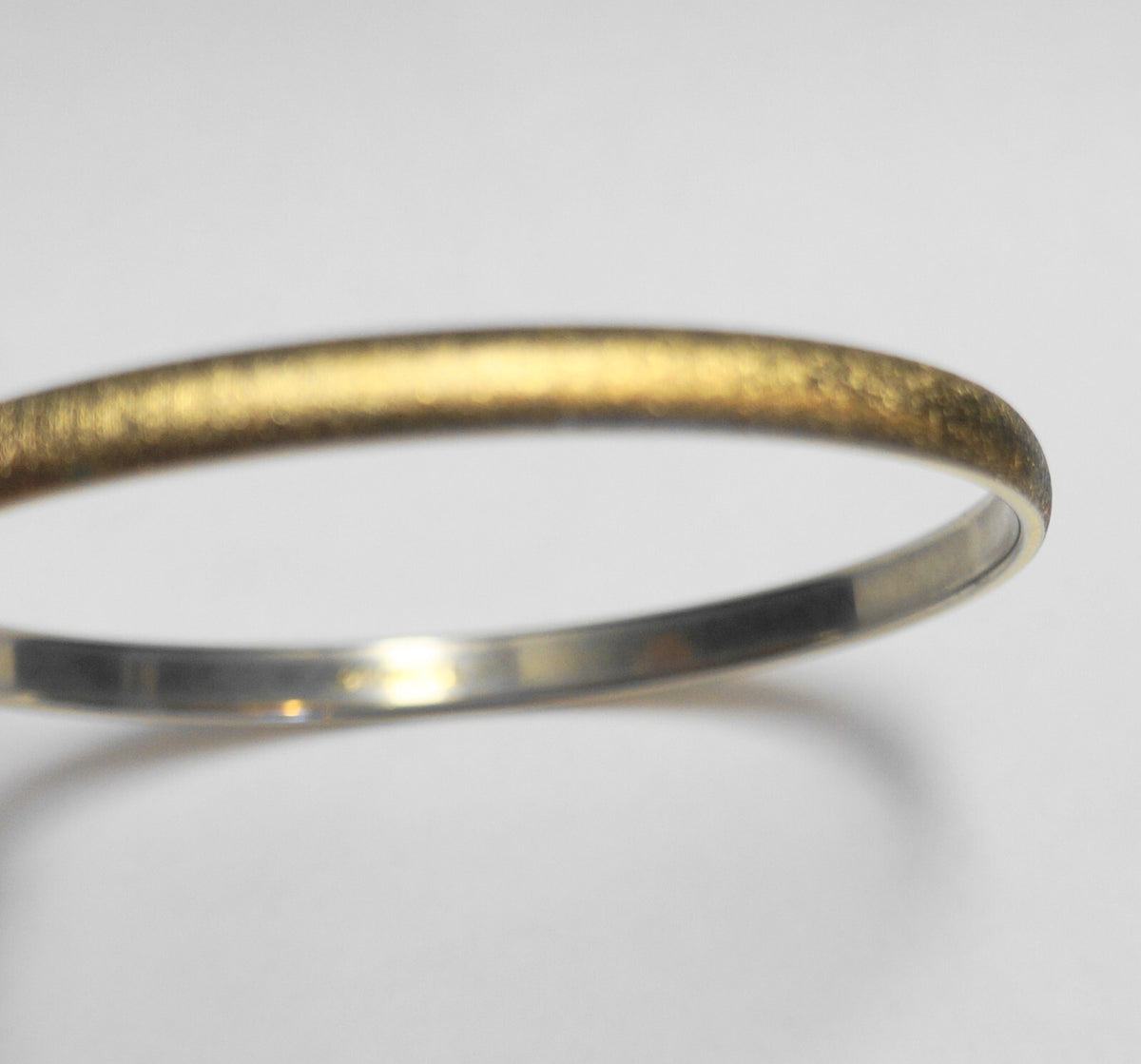 Monet Brushed Gold Tone Narrow Bangle Bracelet