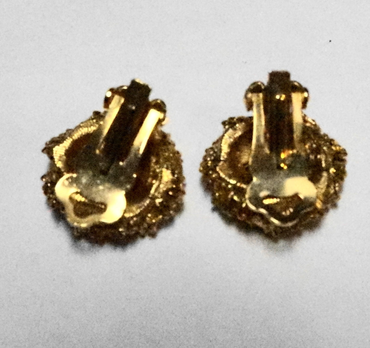 ART Signed Clear Rhinestone Crystal Swirl Gold Tone Clip Earrings