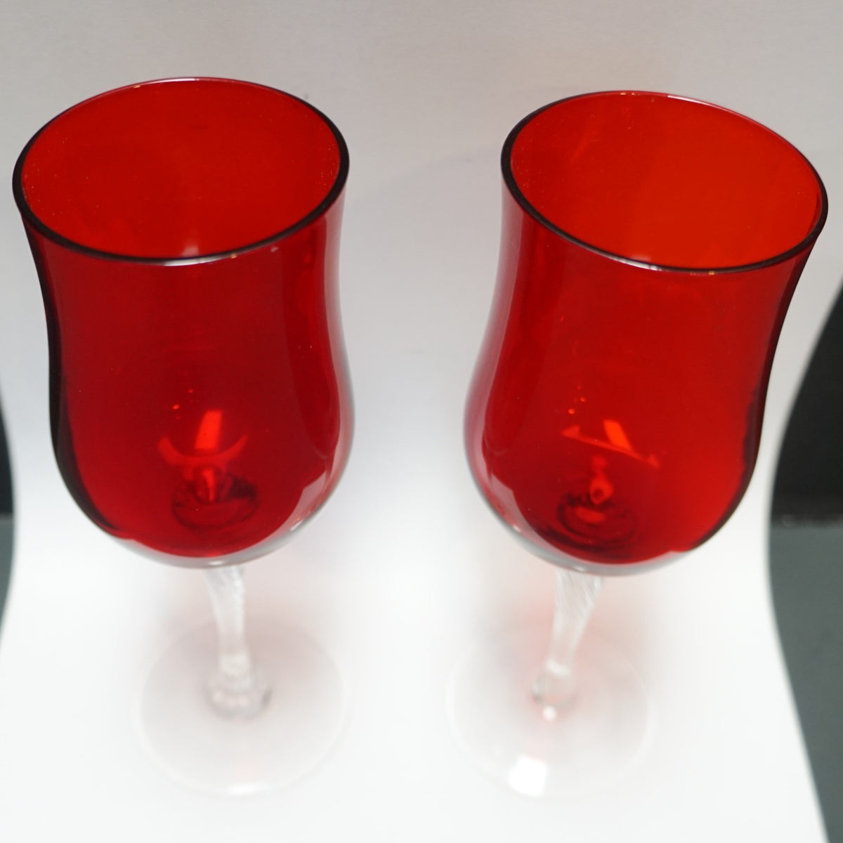 SOLD Saturn Ruby Red Clear Twist Stem Claret Wine Glasses Pair
